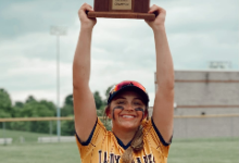 Brianna holding trophy
